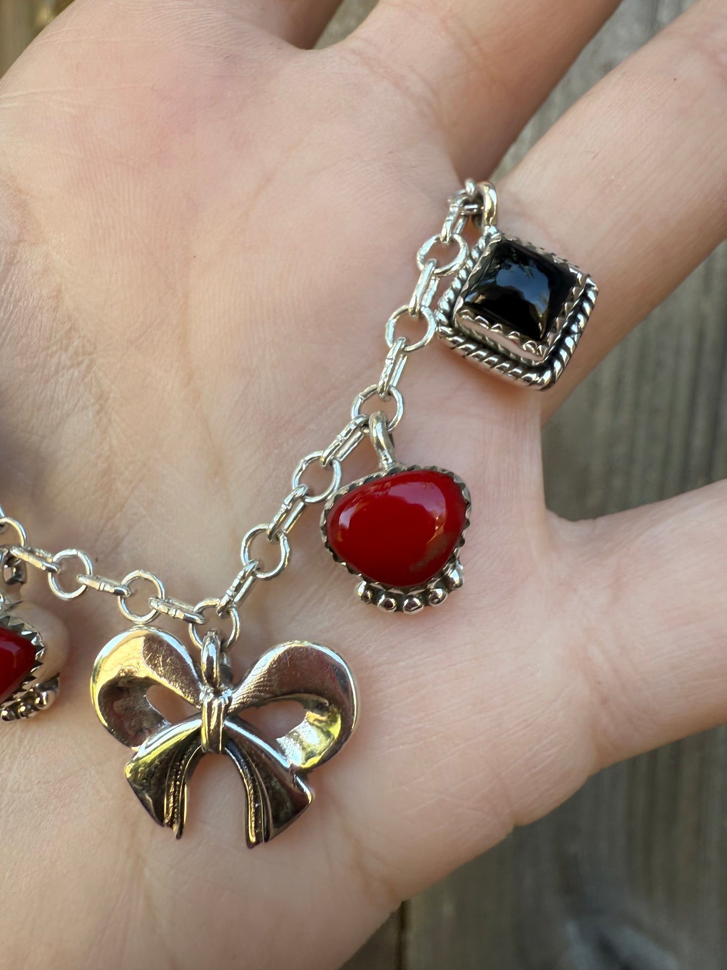 Red Rosarita and Black Onyx Bow Sterling Silver Charm Necklace