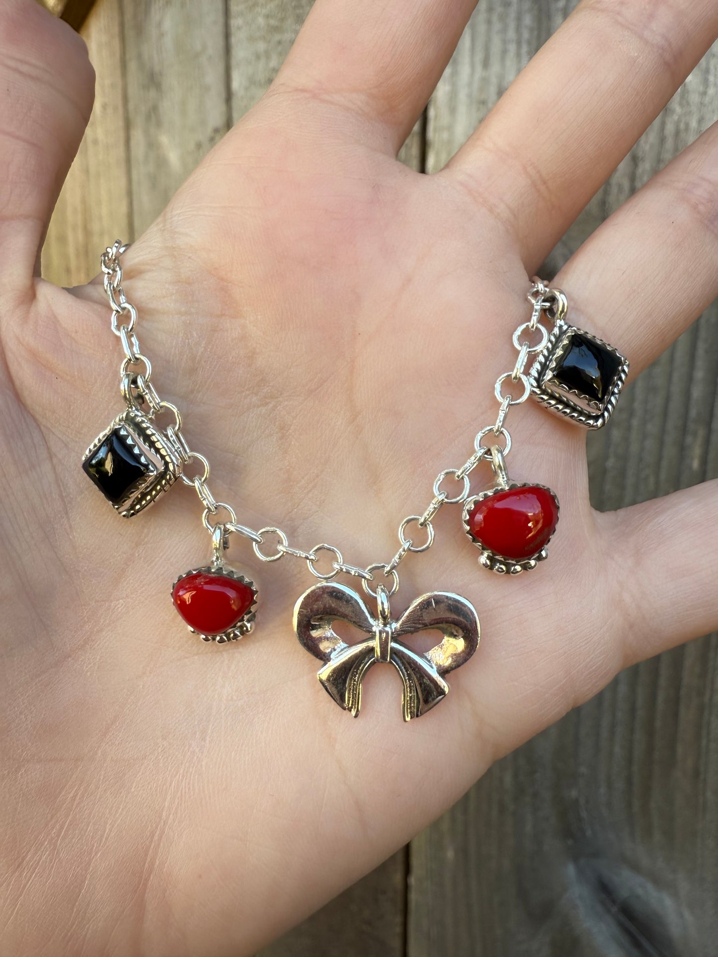 Red Rosarita and Black Onyx Bow Sterling Silver Charm Necklace