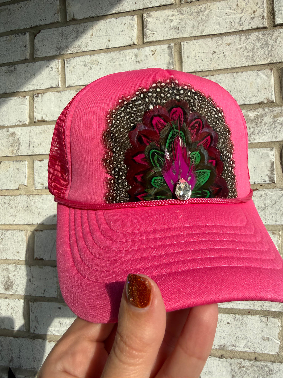 The Feathered Outlaw Retro Trucker Hat