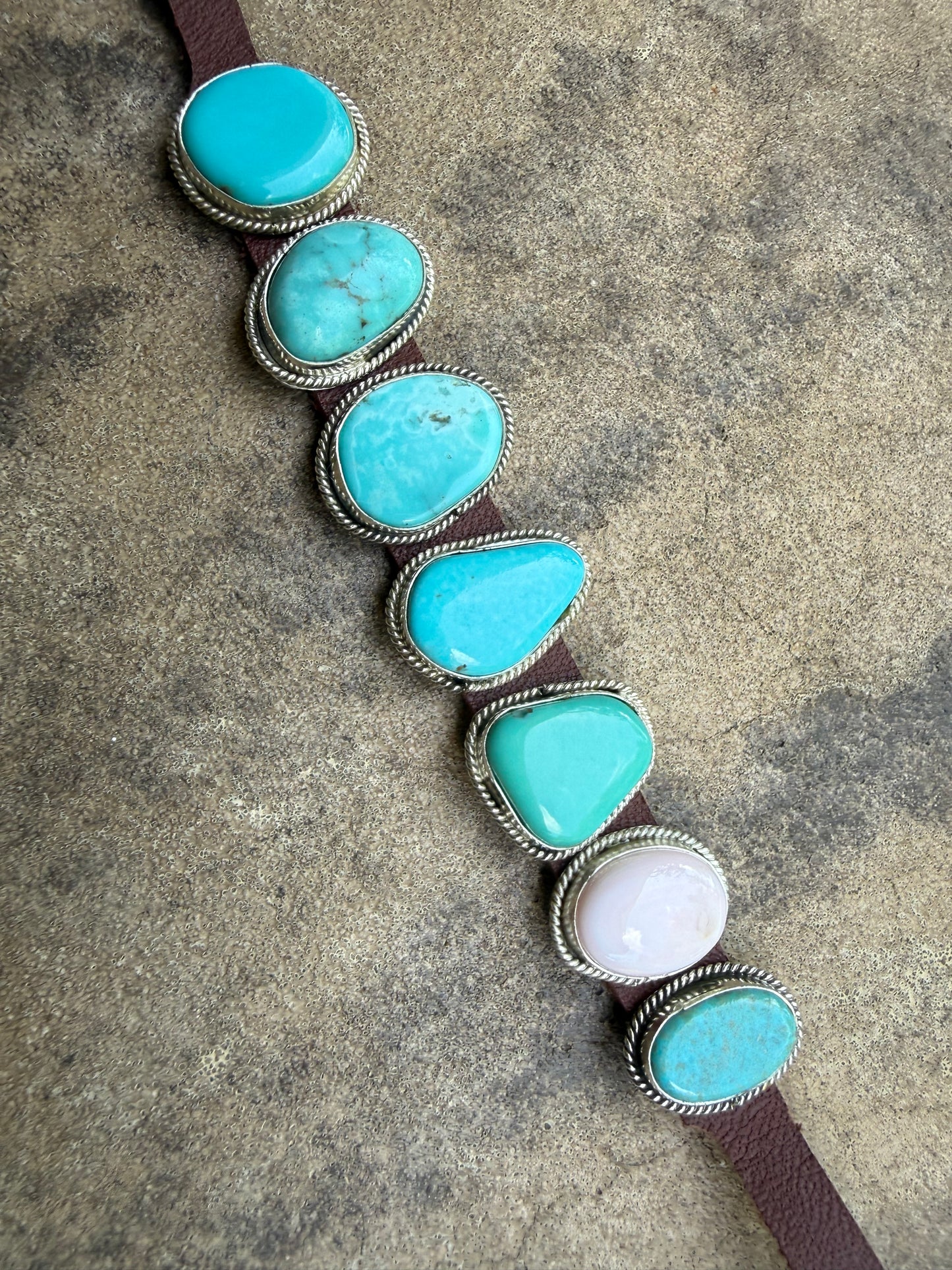 Navajo Turquoise and Pink Conch 7 Stone Sterling Silver And Leather Bracelet