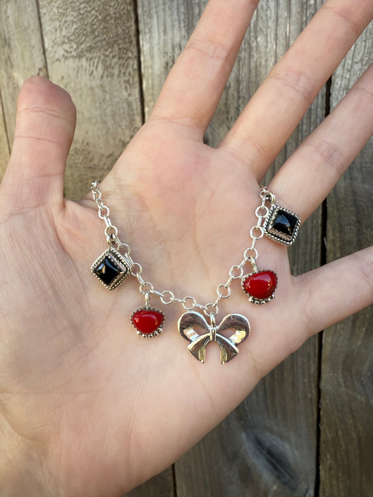 Red Rosarita and Black Onyx Bow Sterling Silver Charm Necklace