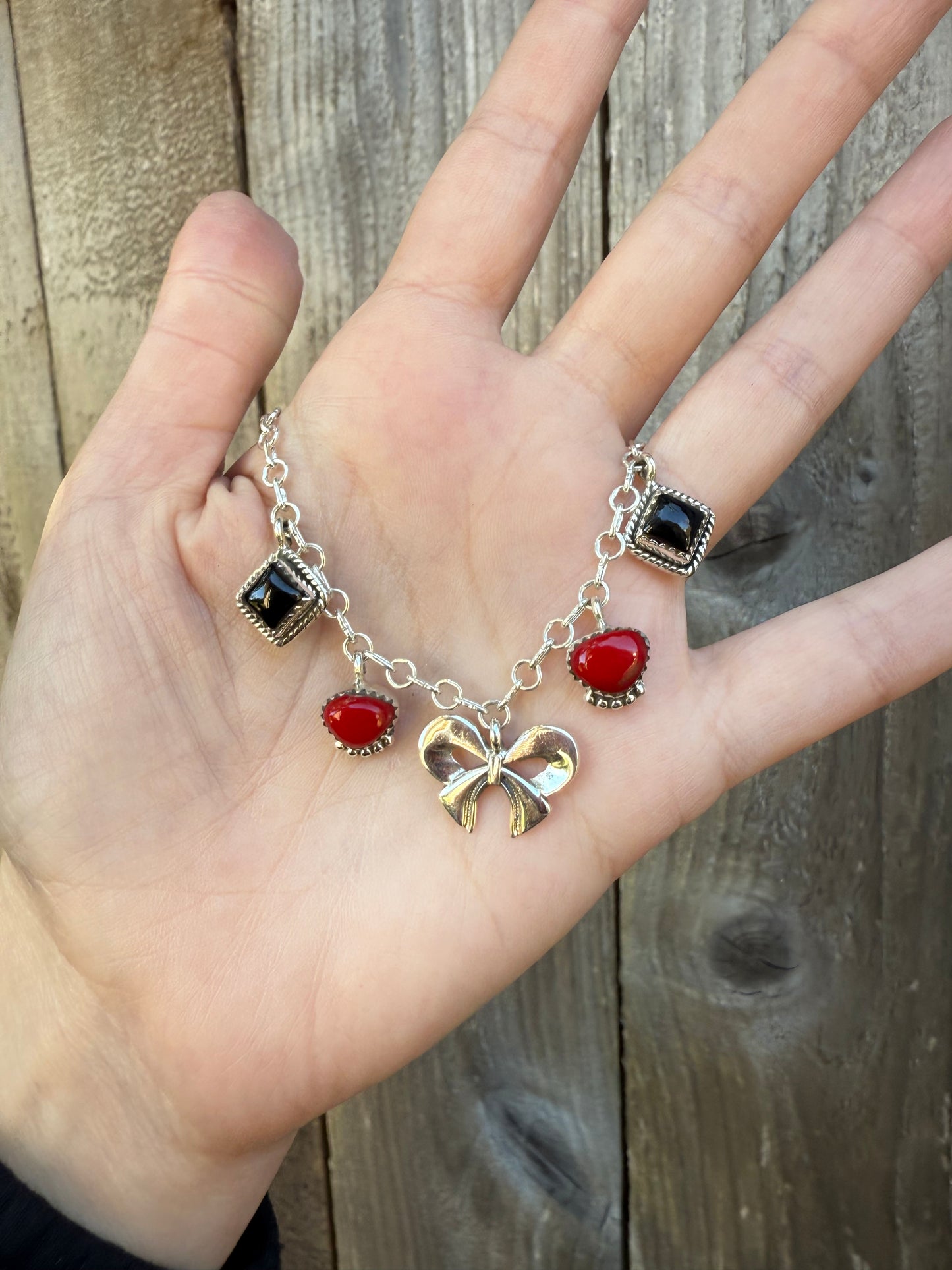 Red Rosarita and Black Onyx Bow Sterling Silver Charm Necklace