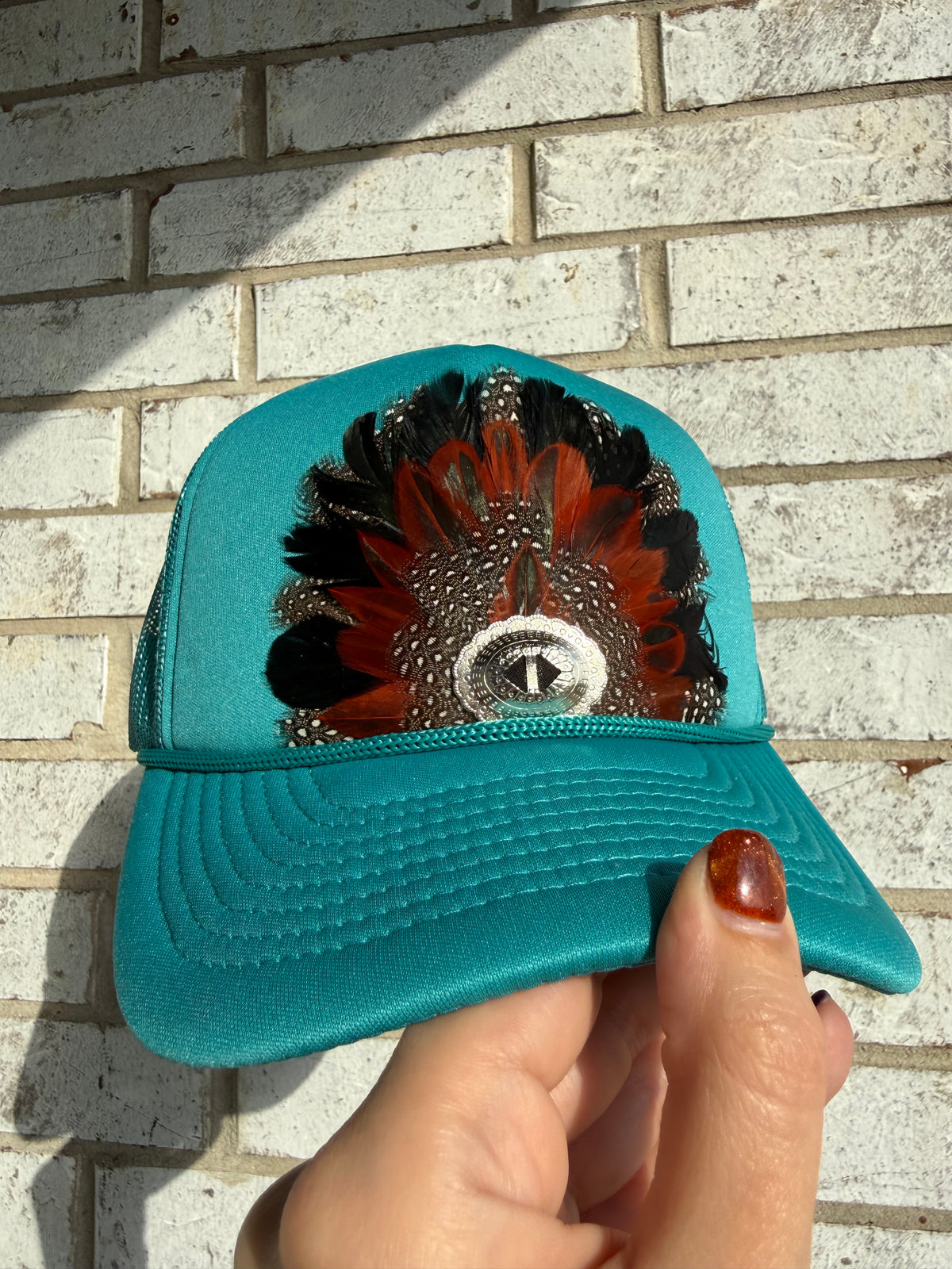 The Feathered Outlaw Retro Trucker Hat
