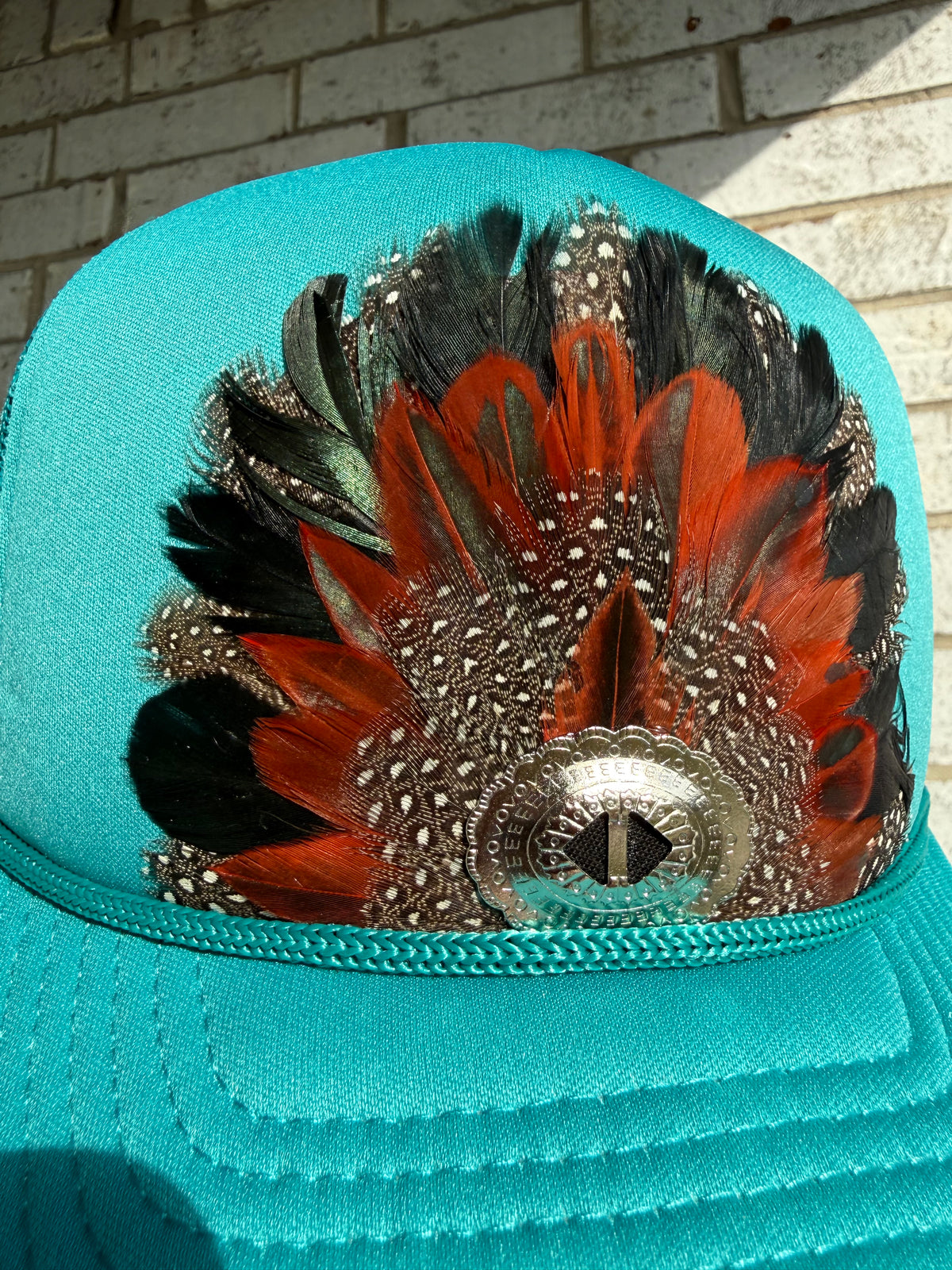 The Feathered Outlaw Retro Trucker Hat